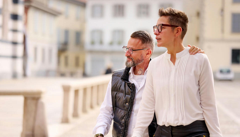 Couple walking man with stoma